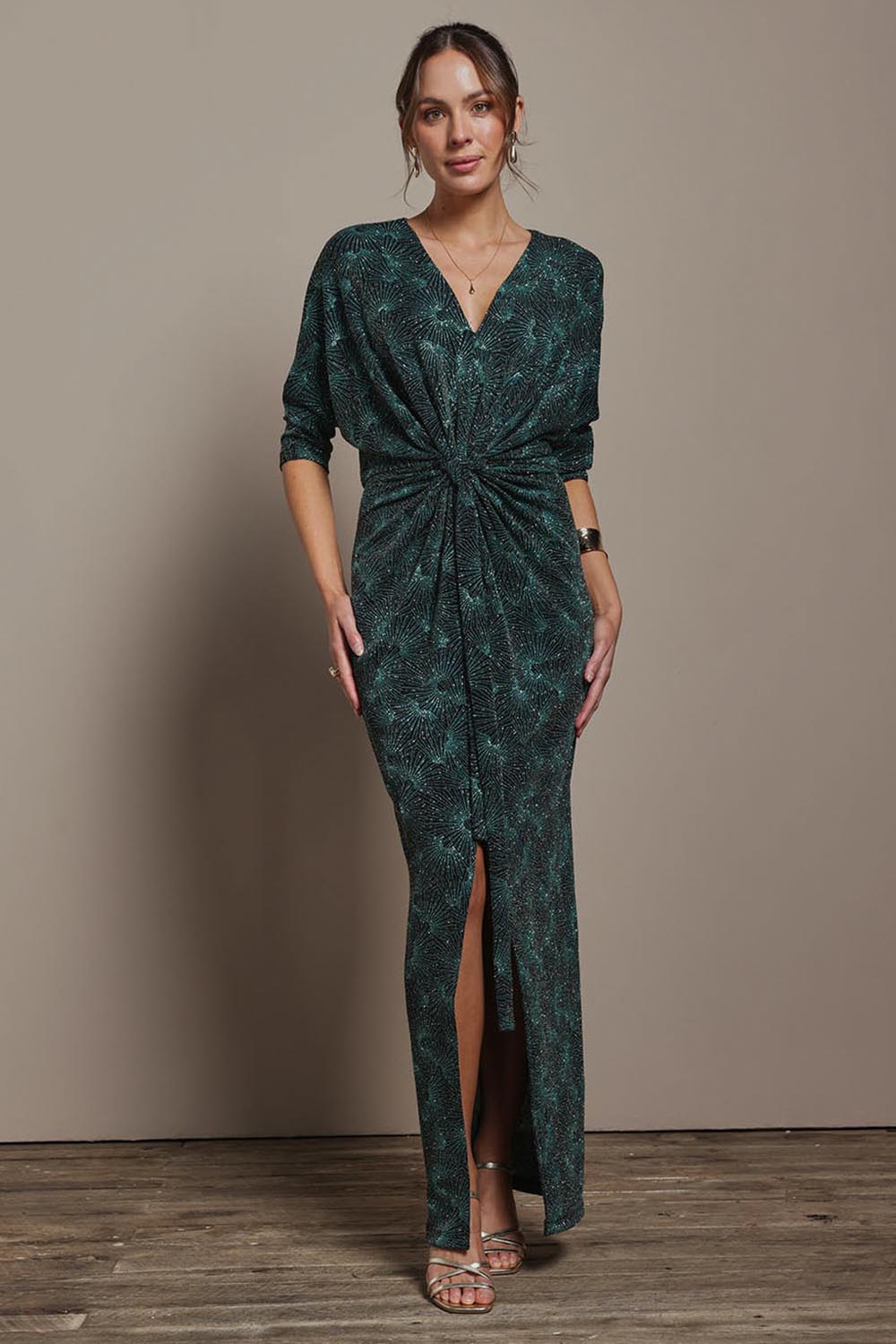 Model Madeline wearing size 10 of The Printed Nadine Dress in colour Jadebling (Green), from the front, showing the whole outfit