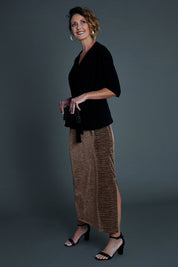 Model Emma wearing size 10 of the Kate Skirt in colour Copper (Metallics), from the front, showing the whole outfit