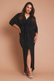 Model Ashleigh wearing size 16 of the Nadine Dress in colour Black (Black), from the front, showing the whole outfit