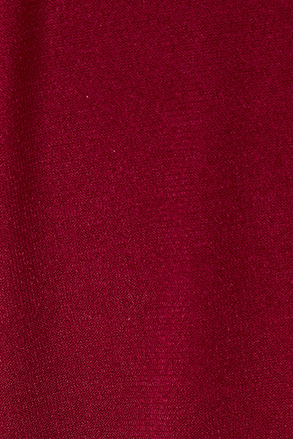 Product shot of the Elisha Dress in colour Flamenco (Red), detail