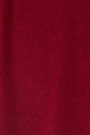 Product shot of the Elisha Dress in colour Flamenco (Red), detail