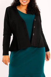Model Sasha-Lee wearing size 16 of the Jamie Jacket in colour Black (Black), from the front, cropped image