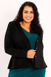 Model Sasha-Lee wearing size 16 of the Jamie Jacket in colour Black (Black), from the front, cropped image