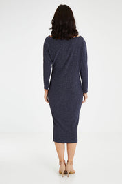 Model Andrea wearing size 10 of the Loreley Dress in colour Twilight (Blue), from the back