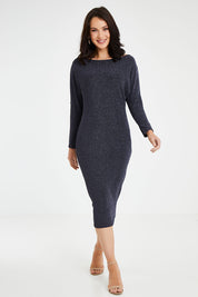 Model Andrea wearing size 10 of the Loreley Dress in colour Twilight (Blue), from the front, showing the whole outfit