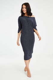 Model Andrea wearing size 10 of the Loreley Dress in colour Twilight (Blue), from the front, showing the whole outfit