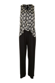 Product shot of the Olivia Jumpsuit in colour Leaf (Black), from the front