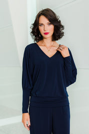 Model Andrea wearing size 10 of the Kelly Blouse in colour Navy (Blue), from the front, showing the whole outfit