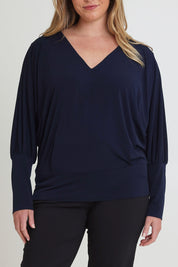 Model Chanel wearing size 16 of the Kelly Blouse in colour Navy (Blue), from the front, cropped image