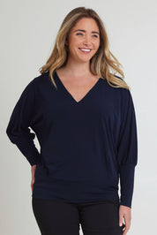 Model Chanel wearing size 16 of the Kelly Blouse in colour Navy (Blue), from the front, cropped image