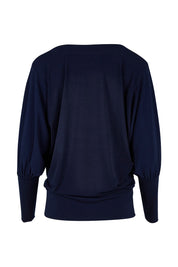 Product shot of the Kelly Blouse in colour Navy (Blue), from the back