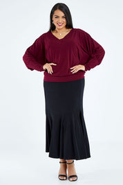 Model Sasha-Lee wearing size 16 of the Kelly Blouse in colour Port (Red), from the front, showing the whole outfit