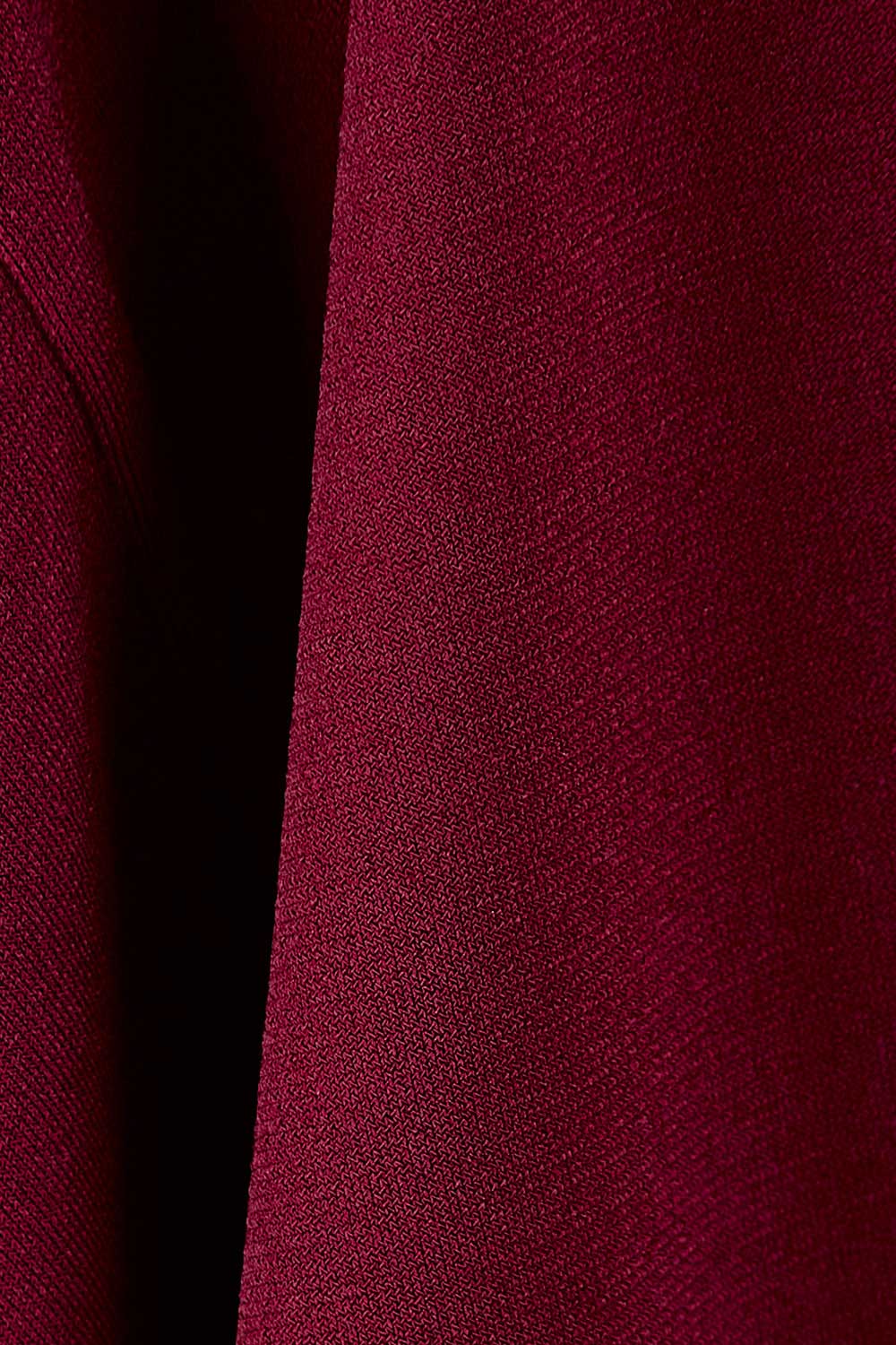 Product shot of the Kelly Blouse in colour Port (Red), detail