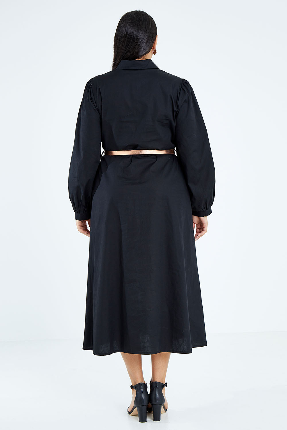 Model Sasha-Lee wearing size 16 of the Jane Shirt Dress in colour Black (Black), from the back