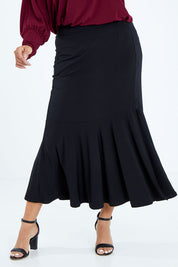 Model Sasha-Lee wearing size 16 of the Emma Skirt in colour Black (Black), from the front, cropped image