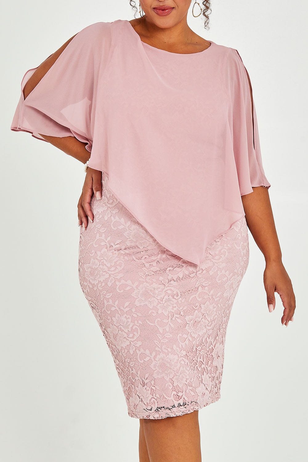 Model Alexis wearing size 16 of the Marnie Dress in colour Dustyrose (Pink), from the front, cropped image