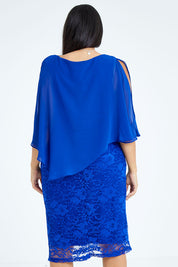 Model Sasha-Lee wearing size 16 of the Marnie Dress in colour Sapphire (Blue), from the back