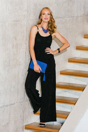 Model Katie wearing size 10 of the Donna Glamorous Top in colour Midnight (Black), from the front, showing the whole outfit