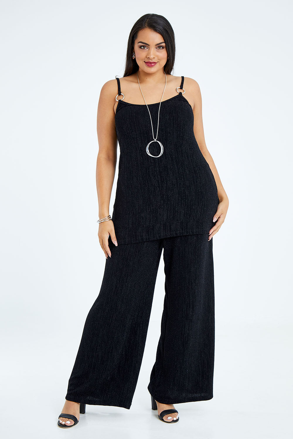 Model Sasha-Lee wearing size 16 of the Donna Glamorous Top in colour Midnight (Black), from the front, showing the whole outfit