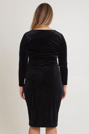 Model Chanel wearing size 16 of the Diana Velvet Dress in colour Black (Black), from the back