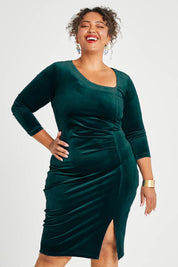 Model Alexis wearing size 16 of the Diana Velvet Dress in colour Ivy (Green), from the front, cropped image