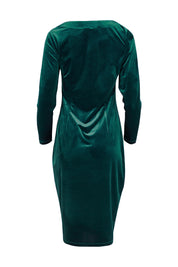 Product shot of the Diana Velvet Dress in colour Ivy (Green), from the back
