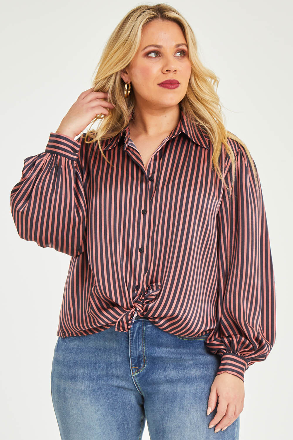 Model Katie wearing size 16 of the Heather Shirt in colour Navypink (Blue), from the front, cropped image