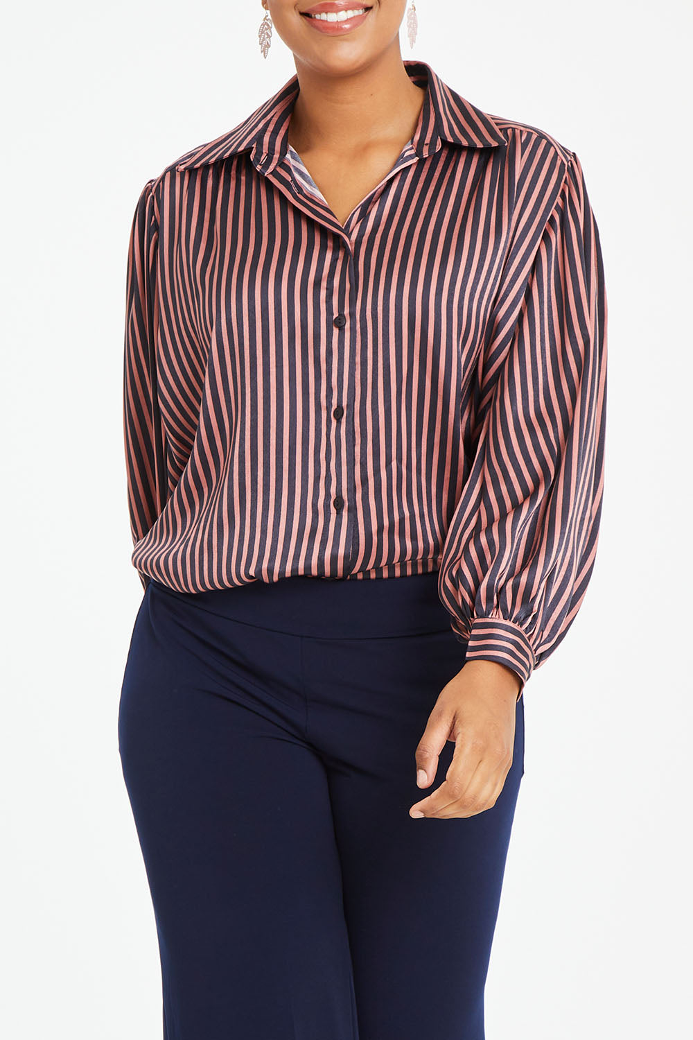 Model Noli wearing size 14 of the Heather Shirt in colour Navypink (Blue), from the front, cropped image