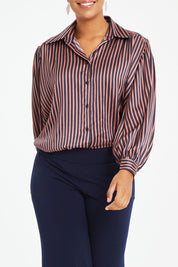 Model Noli wearing size 14 of the Heather Shirt in colour Navypink (Blue), from the front, cropped image