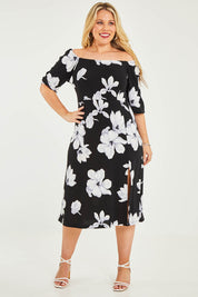 Model Katie wearing size 16 of the Soraya Dress in colour Magnolia (Black), from the front, showing the whole outfit