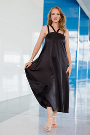 Model Katie wearing size 10 of the Carla Dress in colour Black (Black), from the front, showing the whole outfit