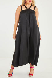 Model Katie wearing size 16 of the Carla Dress in colour Black (Black), from the front, cropped image