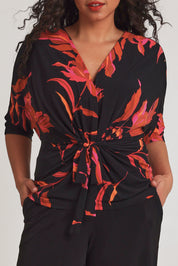 Model Terri-Leigh wearing size 14 of The Printed Niamh Top in colour Firelight (Black), from the front, cropped image