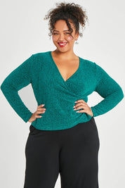 Model Alexis wearing size 16 of the Charlotte Top in colour Jade (Green), from the front, cropped image