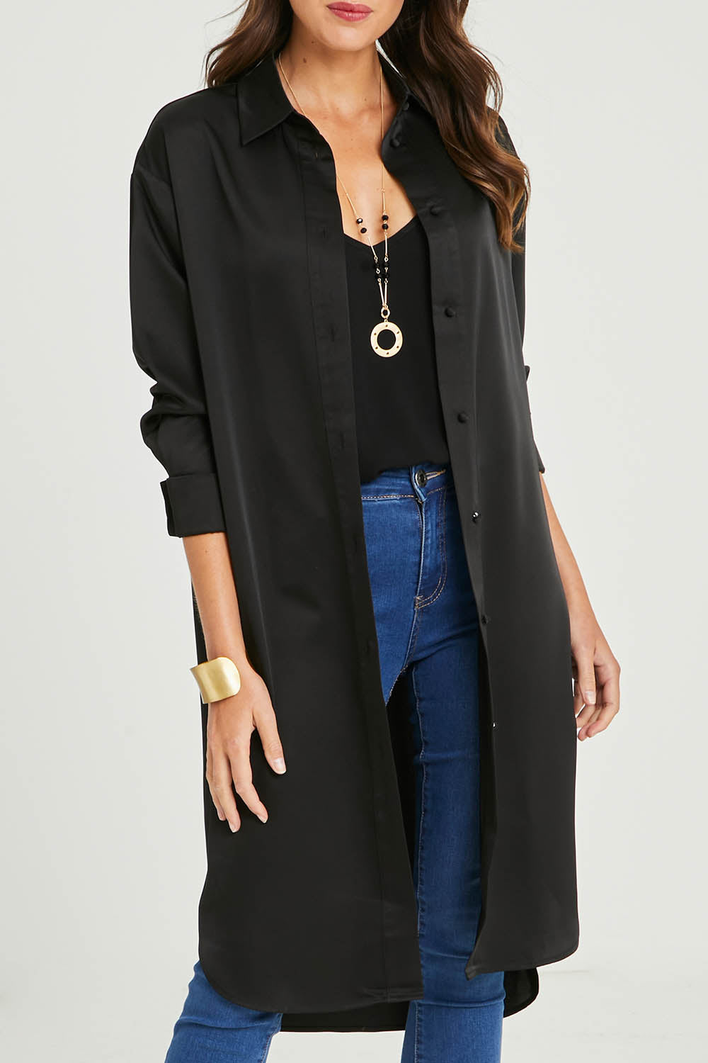 Model Madeline wearing size 10 of the Mandy Shirt in colour Black (Black), from the front, cropped image