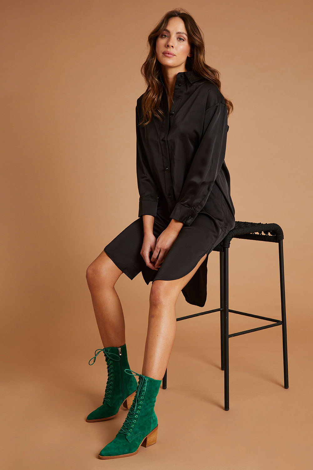 Model Madeline wearing size 10 of the Mandy Shirt in colour Black (Black), from the front, showing the whole outfit