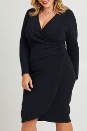 Model Fiona wearing size 16 of the Charleen Dress in colour Midnight (Blue), from the front, cropped image