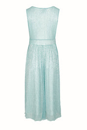 Product shot of the Sally Ann Dress in colour Oasis (Green), from the back