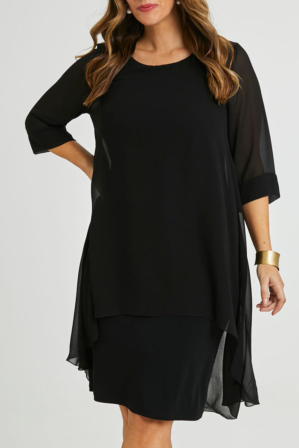 Model Laura wearing size 14 of the Bethany Dress in colour Black (Black), from the front, cropped image
