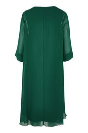 Product shot of the Bethany Dress in colour Pine (Green), from the back