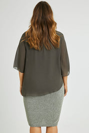 Model Laura wearing size 14 of the Bridgette Dress in colour Khakisilv (Green), from the back
