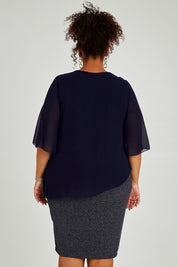 Model Alexis wearing size 16 of the Bridgette Dress in colour Navy (Blue), from the back