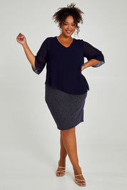 Model Alexis wearing size 16 of the Bridgette Dress in colour Navy (Blue), from the front, showing the whole outfit