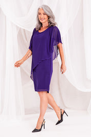 Model Luisa wearing size 10 of the Beatrice Dress in colour Purple (Purple), from the front, showing the whole outfit
