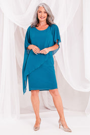 Model Luisa wearing size 10 of the Beatrice Dress in colour Teal (Blue), from the front, showing the whole outfit