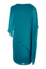 Product shot of the Beatrice Dress in colour Teal (Blue), from the back
