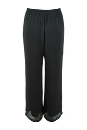 Product shot of the Marie Pants in colour Black (Black), from the back