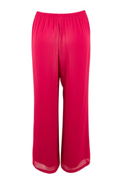 Product shot of the Marie Pants in colour Granita (Pink), from the back