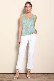 Model Maddiec wearing size 10 of the Reece Sequin Top – Mint in colour Mint, from the front