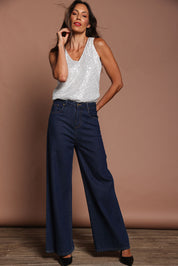 Model Amanda wearing size 10 of the Reece Top in colour Silver (Metallics), from the front, showing the whole outfit